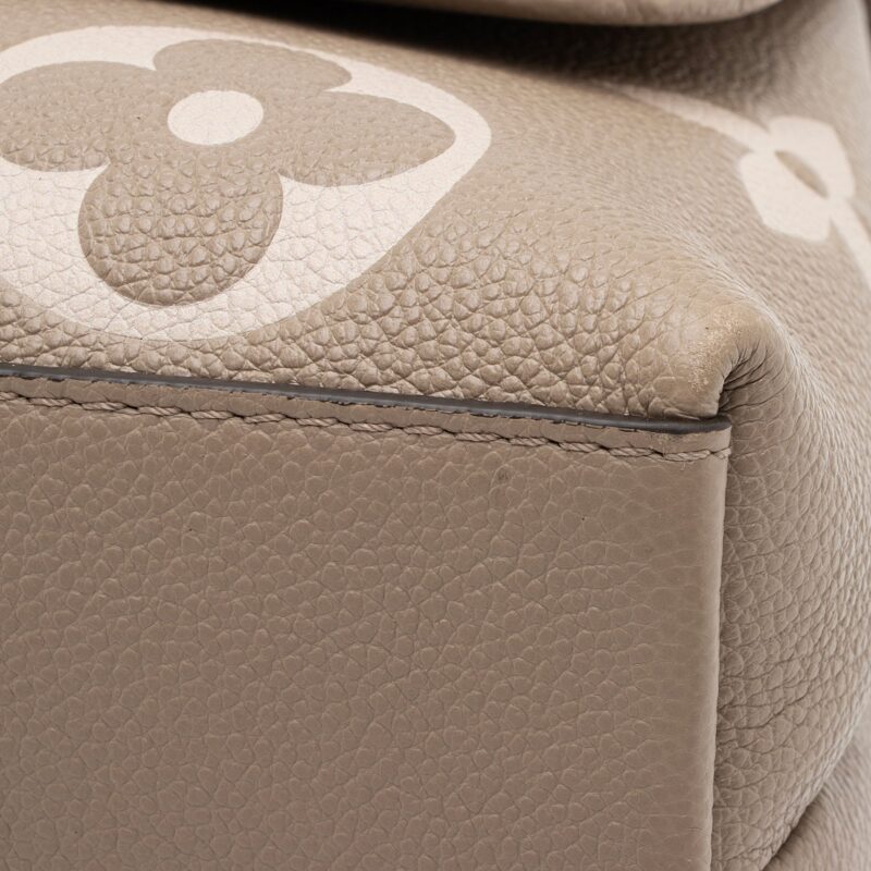 Louis Vuitton Giant Monogram Empreinte Madeleine MM Top Handle Bag (SHF-yODfGB) AWE - Image 14