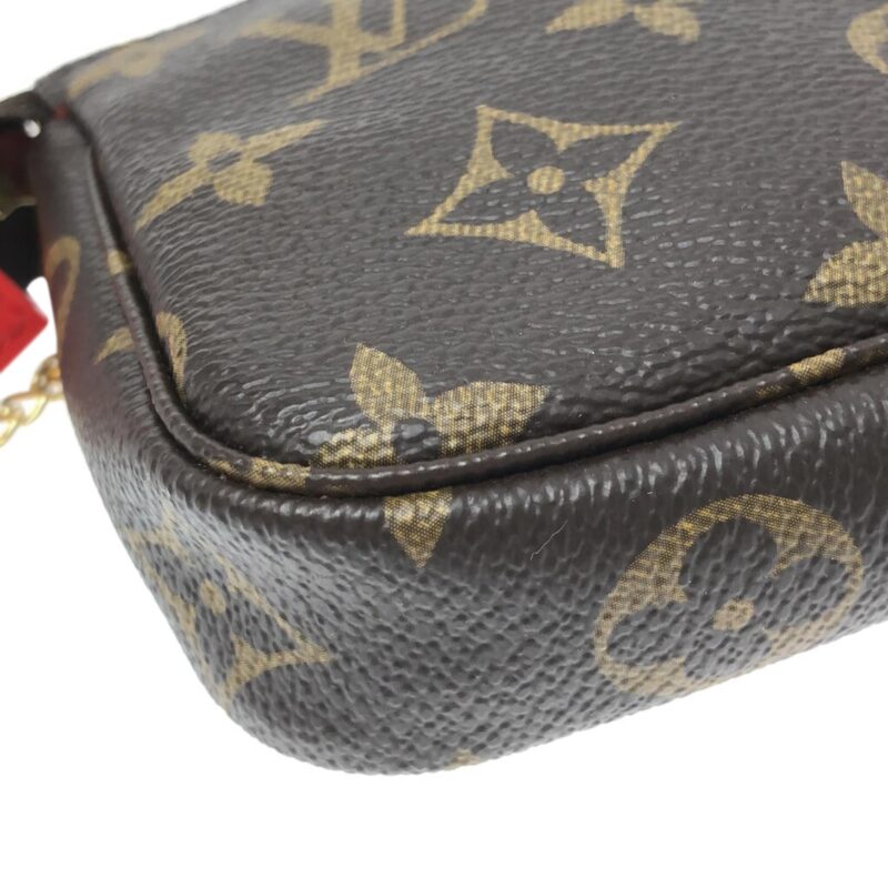 Louis Vuitton Mini Monogram Vivienne Christmas Pochette Accessoires (SHG-G6IN2q) AWE - Image 10